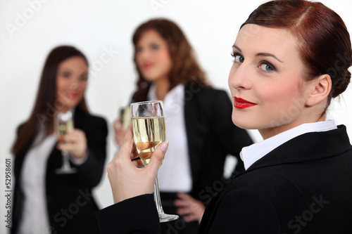 Photo: Three businesswomen toasting success Three businesswomen toasting success