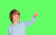 Smiling boy pressing something with the finger