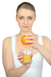 Woman squeezing fresh orange juice