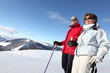 senior couple skiing