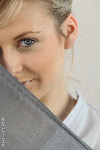 Photo: Shy girl behind scarf Shy girl behind scarf