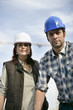 Male and female construction workers