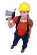 Photo: Blond woman holding blow torch Blond woman holding blow torch