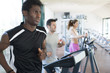 Three athletes in the treadmill