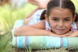 Photo: Young girl lying on the grass Young girl lying on the grass