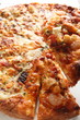 Photo: close up of gourmet seafood pizza close up of gourmet seafood pizza
