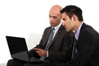 Associates discussing their business plan