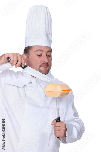 Photo: Chef with a takeaway box Chef with a takeaway box