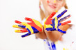 Photo: happy child with paint on the hands happy child with paint on the hands