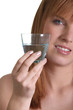 Woman drinking a glass of water