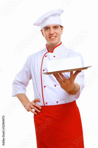 Photo: Cook holding an empty tray Cook holding an empty tray