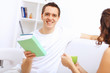Photo: Young happy couple at hone together s Young happy couple at hone together s