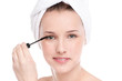 Beautiful woman with make up brush