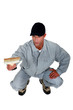 Photo: craftsman painter kneeling and holding a brush craftsman painter kneeling and holding a brush