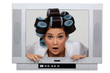 Photo: woman in tv set with hair curlers woman in tv set with hair curlers