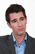 Photo: Businessman looking confused Businessman looking confused