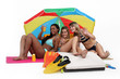 Three women having at the beach