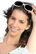 Foto: Brunette with sunglasses Brunette with sunglasses