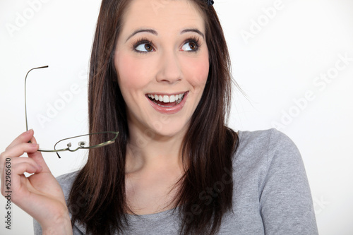 Photo: Young brunette smiling. Young brunette smiling.