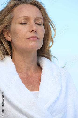 Photo: Mature woman relaxing Mature woman relaxing