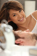 Woman watching her husband sleeping