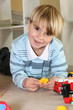 Photo: Little boy playing with toys Little boy playing with toys