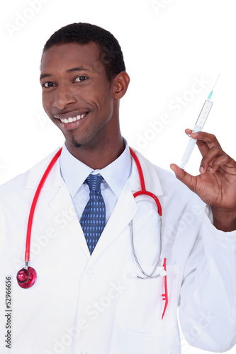 Photo: Man with syringe in hand Man with syringe in hand