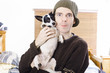 Young casual lifestyle man with small dog