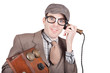Nerd businessman on a funny phone communication