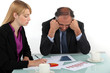 Photo: Executives working in office Executives working in office