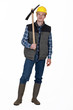 Photo: Man stood with pick-ax Man stood with pick-ax