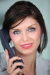 Foto: Woman talking on the telephone Woman talking on the telephone