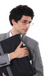 Photo: Man clutching a briefcase Man clutching a briefcase