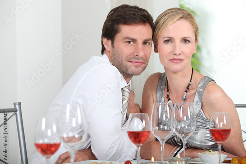 Photo: Couple sat at table Couple sat at table