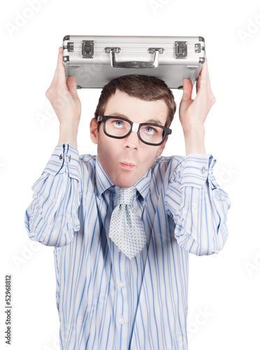 Photo: Man in fear holding suitcase. Business danger Man in fear holding suitcase. Business danger