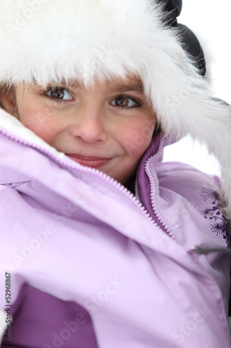 Photo: Cute little girl in winter coat Cute little girl in winter coat