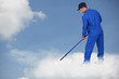 Foto: Photomontage of a worker on a cloud Photomontage of a worker on a cloud