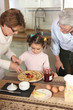 Photo: Family preparing pancakes Family preparing pancakes