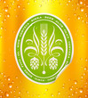 Beer label on beer background with drops