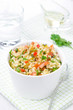 Photo: bowl of salad with bulgur, zucchini, tomatoes, chili peppers bowl of salad with bulgur, zucchini, tomatoes, chili peppers