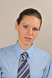 Serious girl, dressed in business clothing