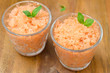 Photo: tomato sorbet with basil in a glass horizontal top view tomato sorbet with basil in a glass horizontal top view