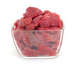 pieces of fresh beef in a glass bowl