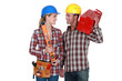 craftsman and craftswoman posing together