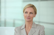 Blond woman thinking