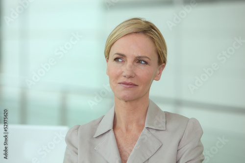 Photo: Blond woman thinking Blond woman thinking