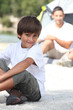 Photo: Boy and his Dad camping Boy and his Dad camping