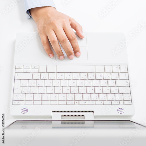 Photo: Female hand with laptop Female hand with laptop