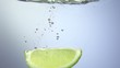Video: Fresh lime dropped into water with splash Fresh lime dropped into water with splash