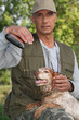 Foto: Hunter with shotgun and spaniel Hunter with shotgun and spaniel